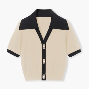 Black and cream Short Sleeve Sweater. Size medium never worn.